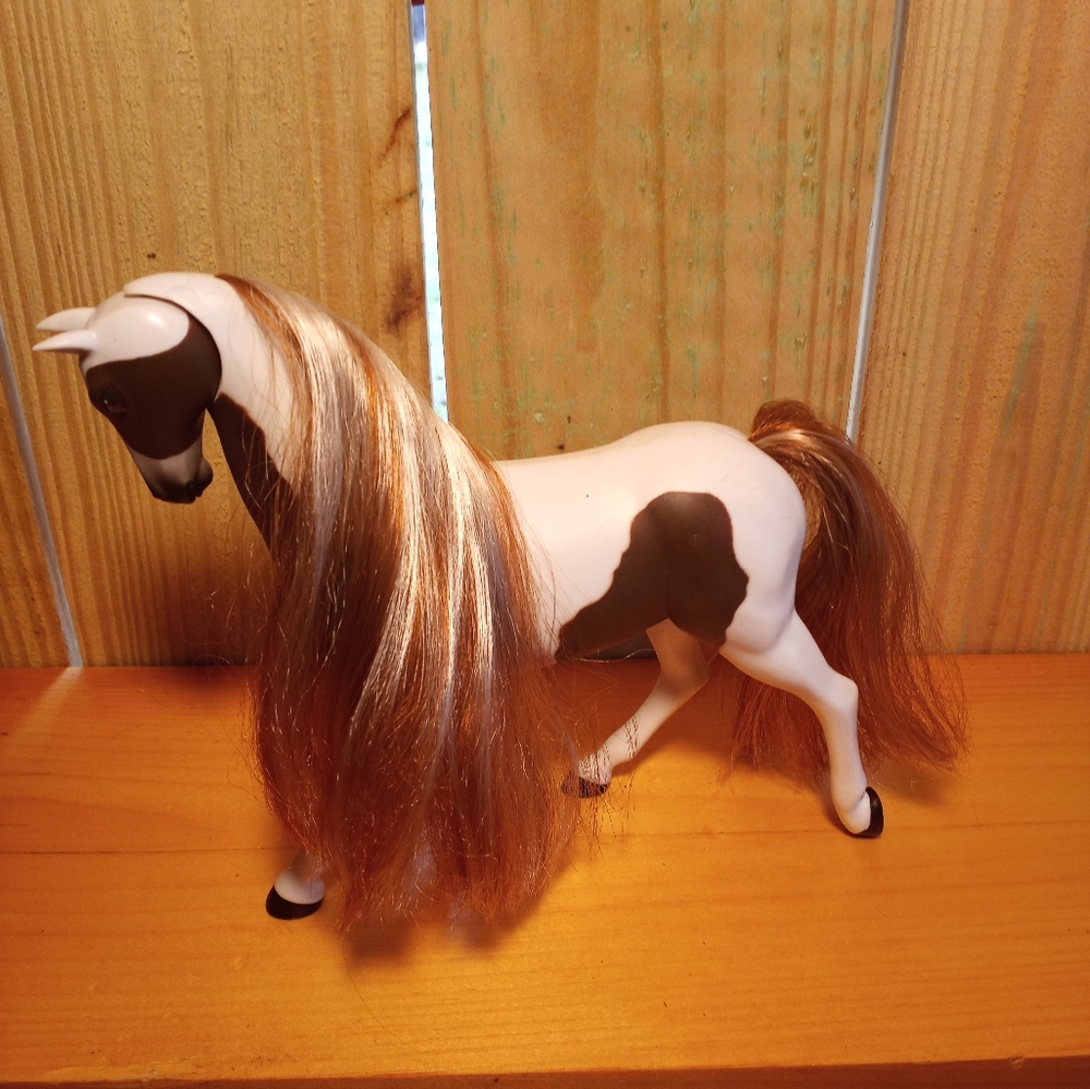 Brown and White Toy Horse with Long Mane